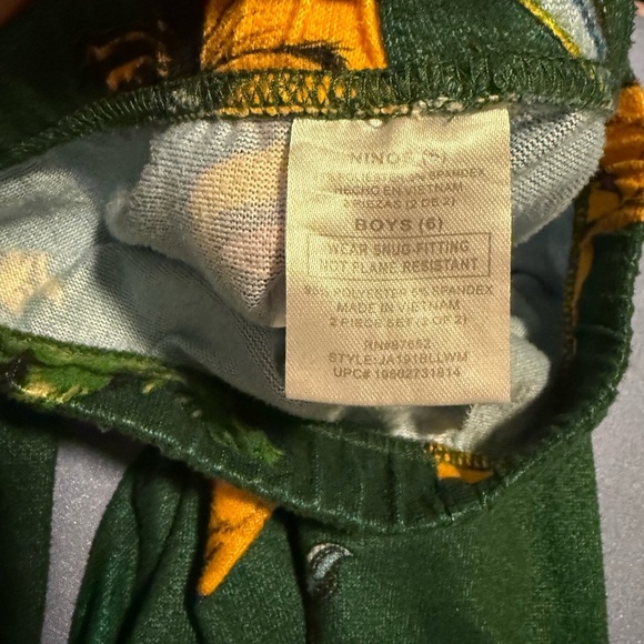 Jurassic World Ninja Green and Yellow Pajama Set with Dinosaur Theme - Picture 3 of 4